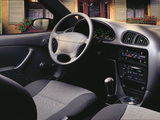 Images of Chevrolet Metro Coupe 1998–2001