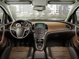 Opel Astra Sports Tourer (J) 2010–12 images