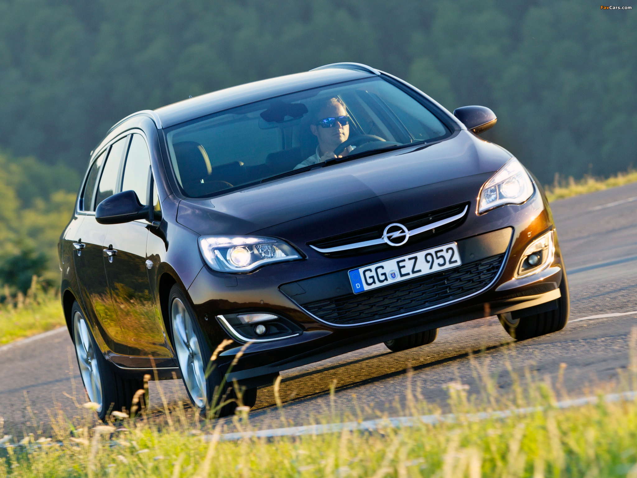 Opel Astra Sports Tourer (J) 2012 photos (2048 x 1536)